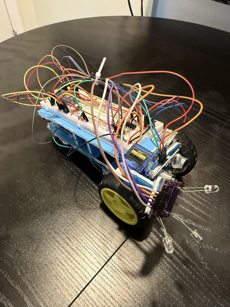 Robot top-down view showing breadboard and wiring