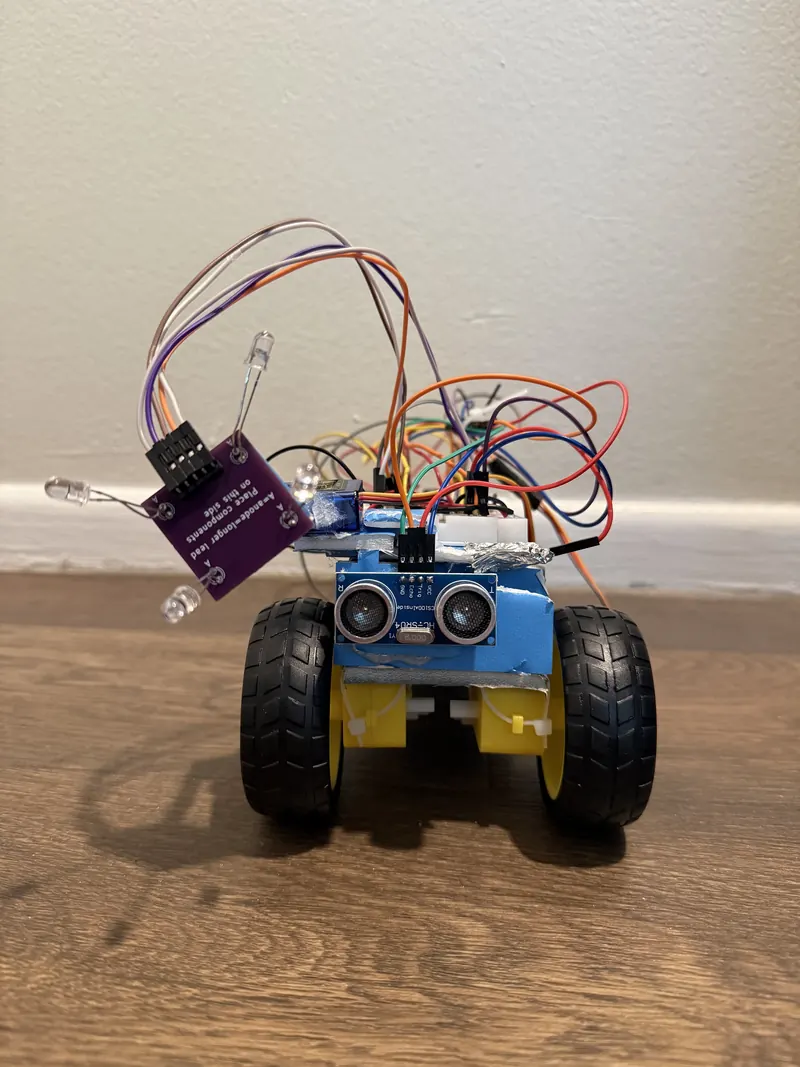 Robot front view showing ultrasonic sensor and photodiode leads